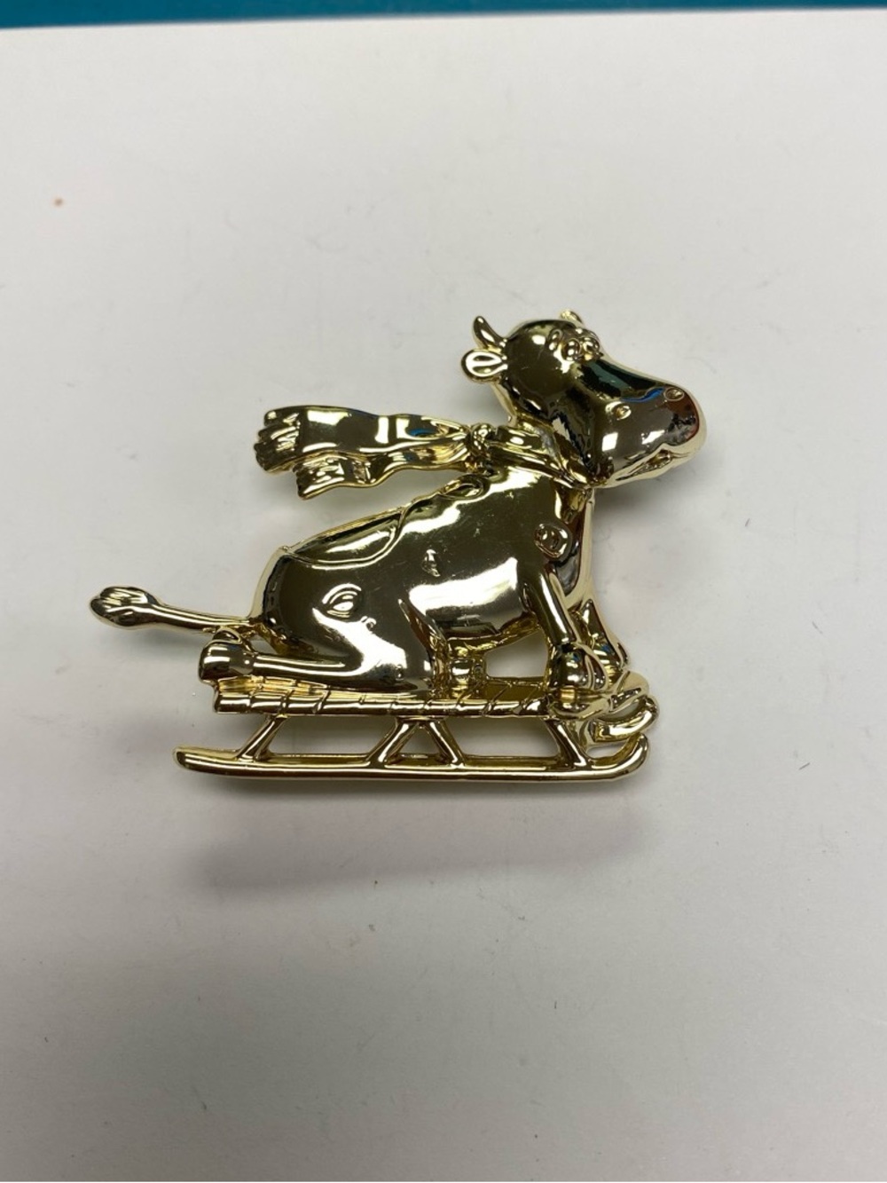 Vintage AJC Gold tone Cow Sled brooch